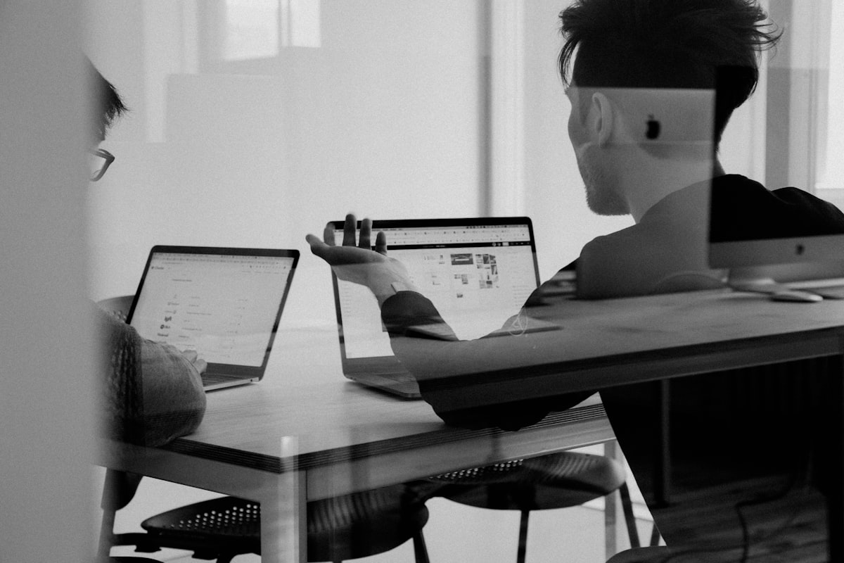 Digital records on a tablet next to a calculator